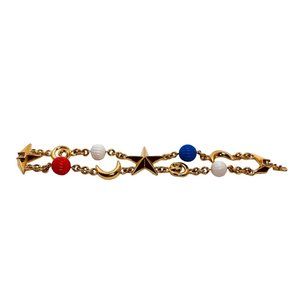 Monet Double Strand Gold Tone Stars & Moon W/Red, White And Blue Beads Bracelet